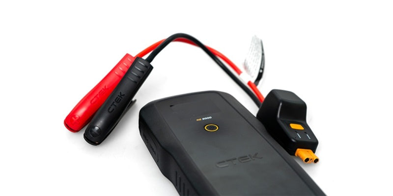 CTEK Battery Booster with flashlight, 12V jump starter, 3000A peak current, portable automotive battery jump starter device.