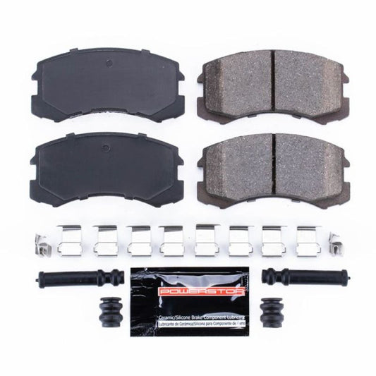 PowerStop performance front brake pads with hardware for Mitsubishi Lancer Z23 Evolution Sport, designed for enhanced braking performance.