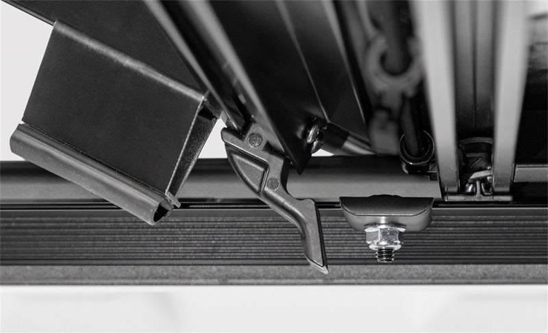 Access LOMAX tri-fold truck bed cover in matte black on a 2020+ Chevy/GMC 2500/3500 full-size 6ft 8in bed, exterior accessory.