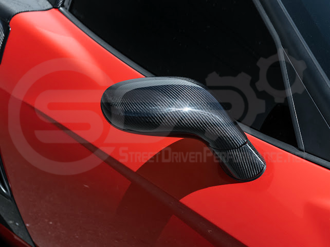 Set of four dry carbon fiber side mirror cap covers for 2005-2013 Chevy Corvette C6, tape-on style, by Street Driven Performance.