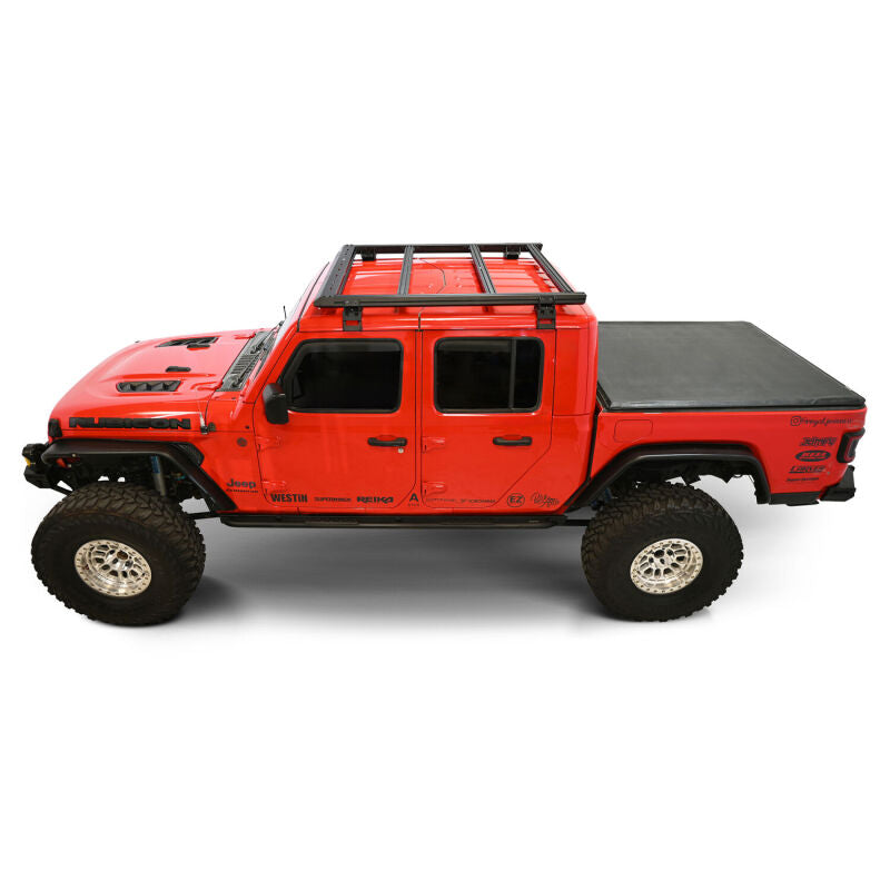 Westin Jeep Gladiator Mesa roof rack in black, mounted on the vehicle's roof for cargo transportation and outdoor adventures.
