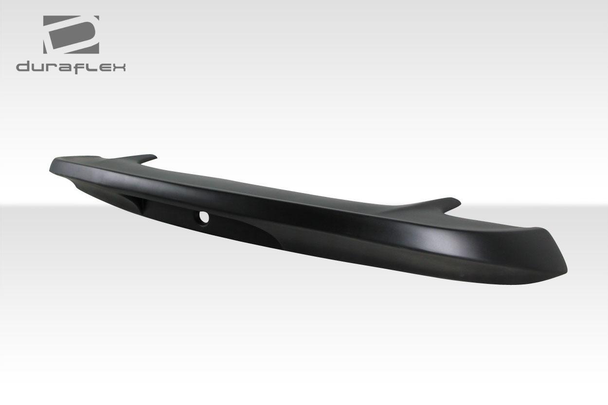 Duraflex Colt rear wing for 1999-2004 Ford Mustang, aerodynamic wing with mounted brackets, black fiberglass finish.