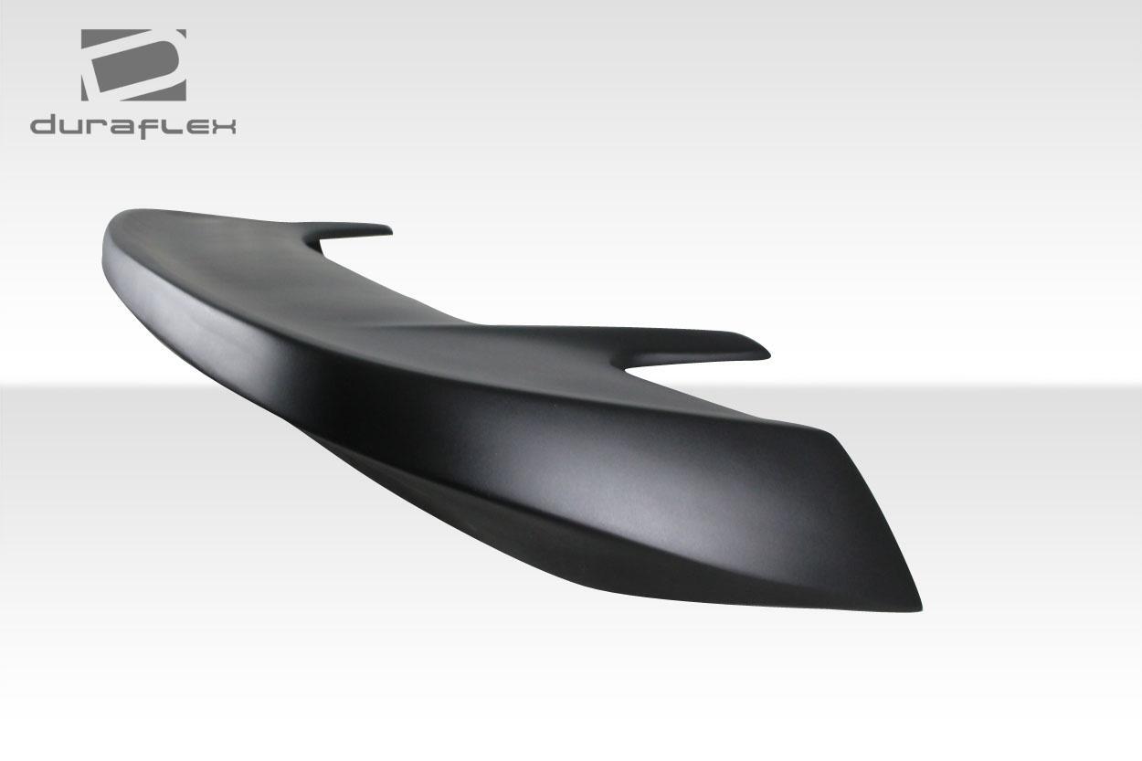Duraflex Colt rear wing for 1999-2004 Ford Mustang, aerodynamic car wing with sleek design and mounting hardware visible.