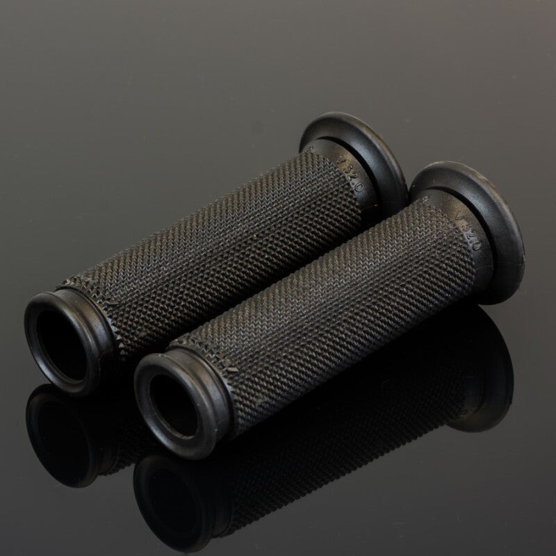 Renthal Road Extra Firm Compound motorcycle grips in charcoal color with 32mm outer diameter, designed for enhanced grip and control.