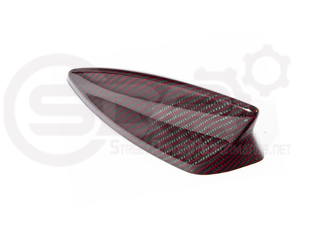 Red carbon fiber shark fin antenna cover for 2014-up Cadillac ATS, CTS, CT4, and CT5 by Street Driven Performance.