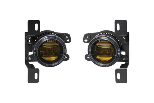 Pair of Diode Dynamics Elite Series Type MR yellow fog lamps showing bright LED bulbs and sleek black housing.