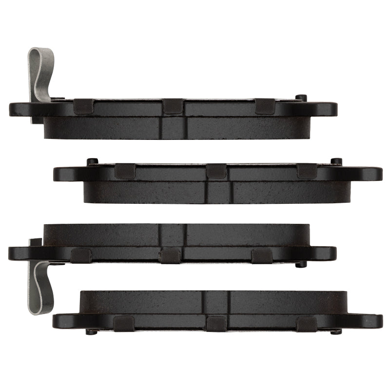 R1 Concepts ceramic brake pads for Ford Escort R1 94-03 rear OE brake pads installed in a vehicle.