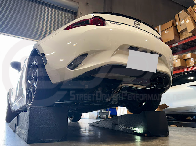 Mazda MX-5 Miata ND exhaust muffler delete axle back system with 4-inch burnt or chrome tips, street performance exhaust upgrade.
