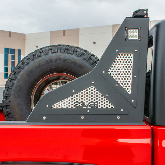 DV8 Offroad 2019+ Jeep Gladiator chase rack installed on truck bed for added cargo security and off-road protection.
