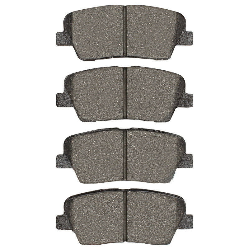 R1 Concepts Genesis G70 rear OE ceramic brake pads for R1 07-23 model, showing the brake pad set with branding and metallic backing.