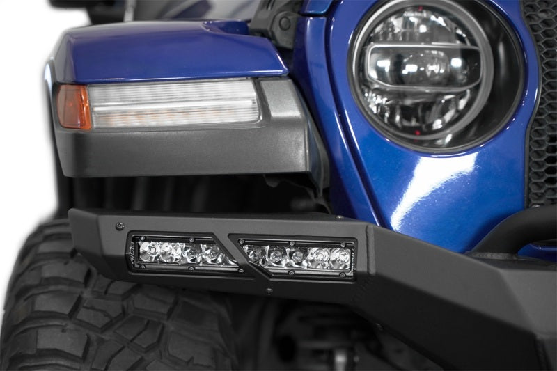 Addictive Desert Designs steel rear bumper for Jeep Wrangler JL and Gladiator JT with integrated winch mount, black finish.
