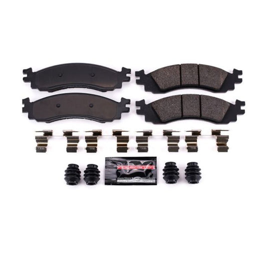 PowerStop Z23 Evolution Sport brake pads with hardware installed on a Ford Explorer front wheel, performance brake components.