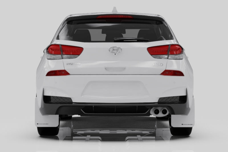 Rally Armor black mud flaps with blue logo on a Hyundai Elantra GT N Line or i30, designed for 2019-2021 models.