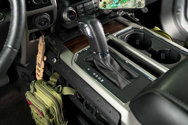 DV8 Offroad Ford F150/F250 center console Molle panels with device mount, exterior trim for 2015-2021 models, durable offroad accessory.