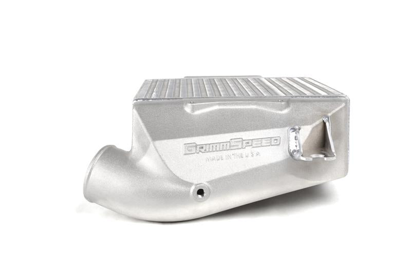 GrimmSpeed 15-21 Subaru WRX top mount intercooler kit installed in engine bay with black finish and mounting hardware visible.