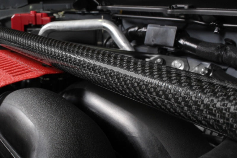 PERRIN carbon fiber front strut brace for Subaru BRZ, Toyota GR86, 86, and Scion FR-S with sleek, lightweight performance design.