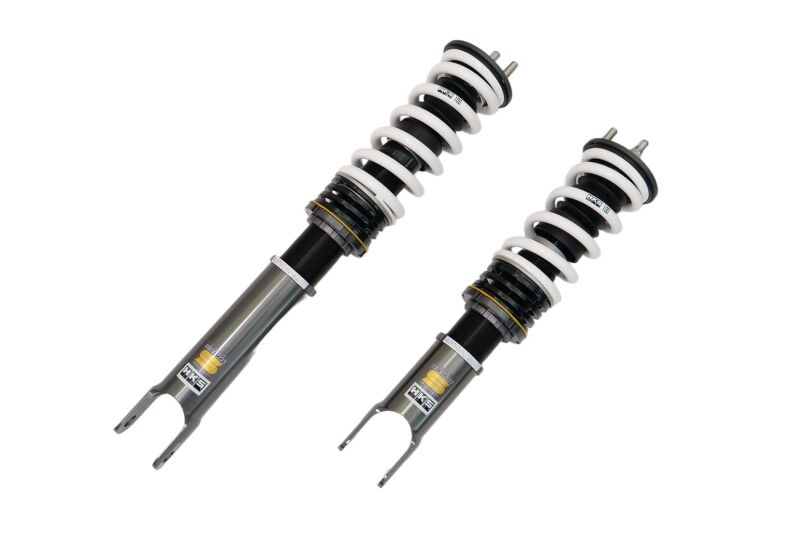 HKS HIPERMAX S AP1 coilover suspension kit installed on a vehicle, showcasing adjustable shock absorbers and coil spring setup.