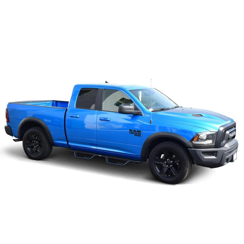 Westin Outlaw Drop Nerf Step Bars in textured black on a Ram 1500 Quad Cab/Classic model, providing side access and style.