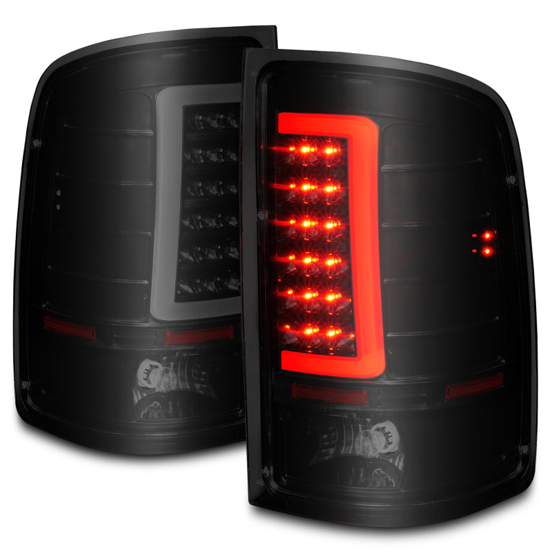 ANZO LED tail lights for 2007-2013 GMC Sierra with black housing and smoke lens, featuring integrated light bar for enhanced visibility
