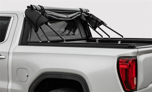 Access 2024+ Toyota Tacoma 5ft bed soft truck topper, Outlander model, shown installed on pickup truck with fabric cover