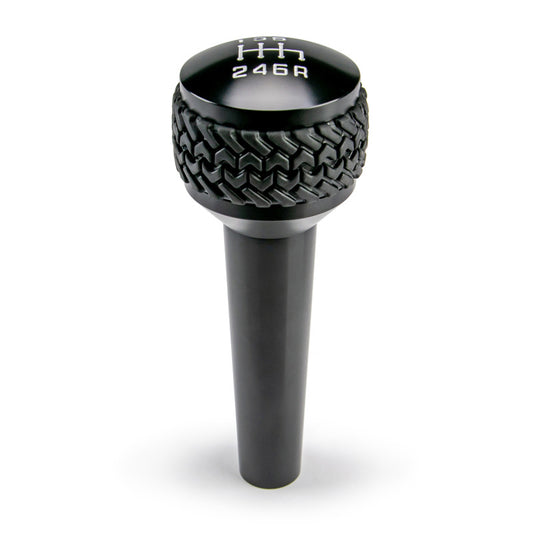 DV8 Offroad black 6-speed shift knob for 2005-2010 Jeep TJ and JK, featuring a durable finish and ergonomic design.