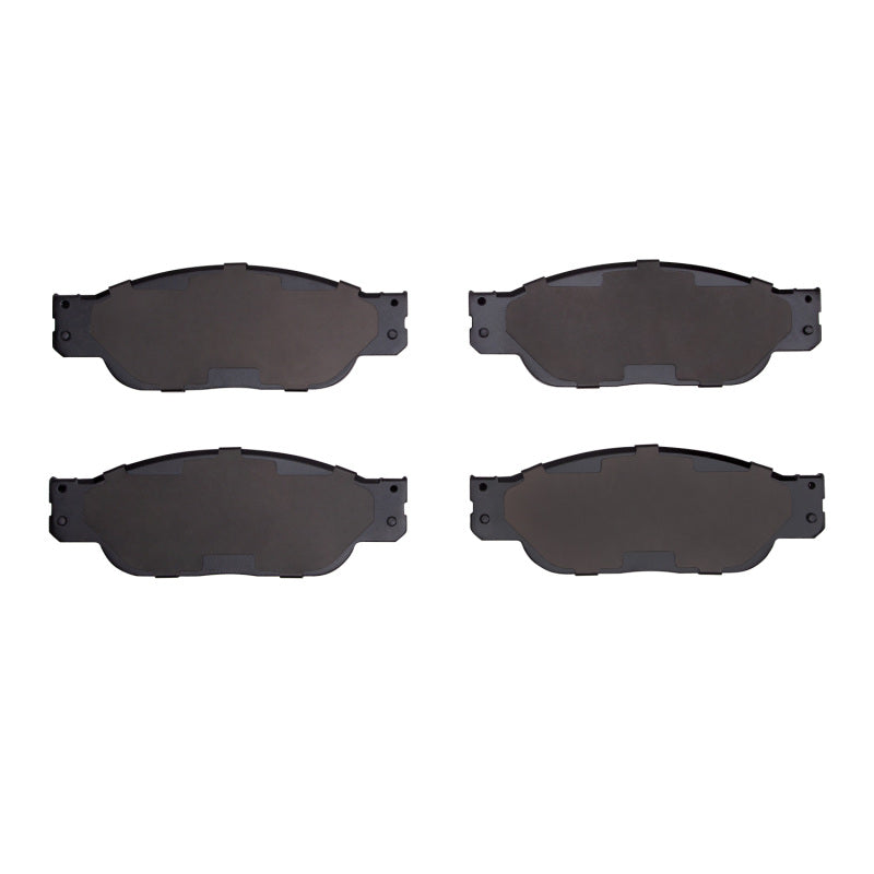 R1 Concepts Lincoln LS front ceramic brake pads, OE quality, with detailed surface texture and mounting hardware visible.