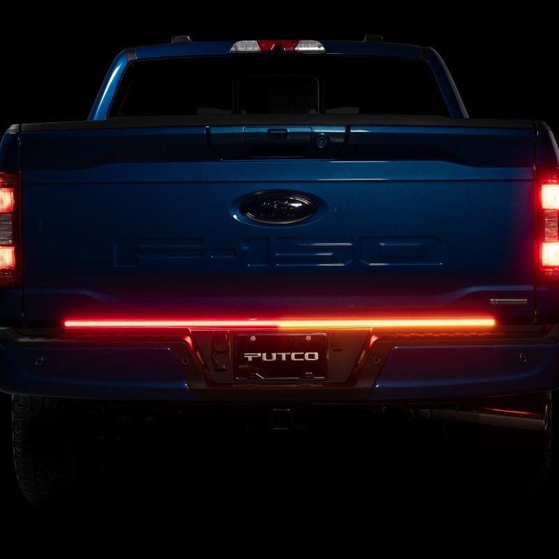 Putco 2024+ Ford F150 tailgate light bar with factory LED tail lights and 60-inch Blade Tailgate Light Bar, plug-and-play installation.