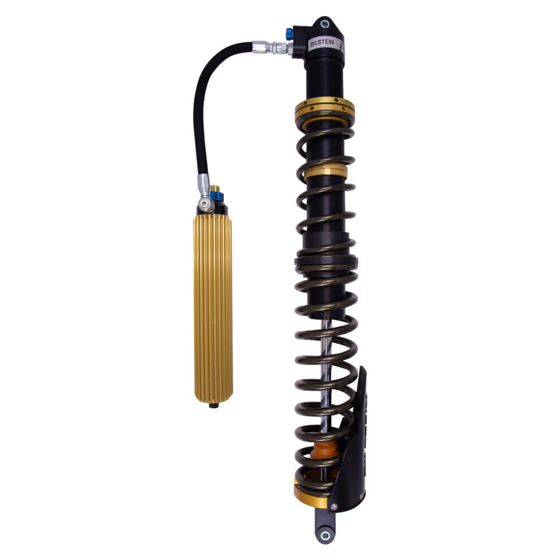 Bilstein coilovers with black shock absorber and coil spring for Can-Am Maverick X3 Max RS Turbo off-road vehicle.