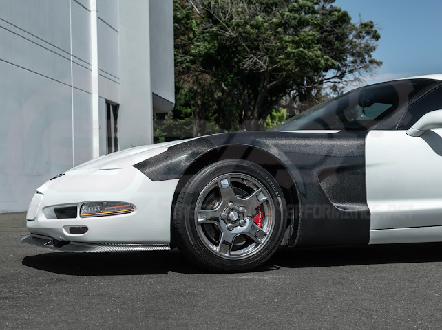 Factory style carbon fiber front and rear widebody fenders for 1997-2004 Chevrolet Corvette C5 by Street Driven Performance.
