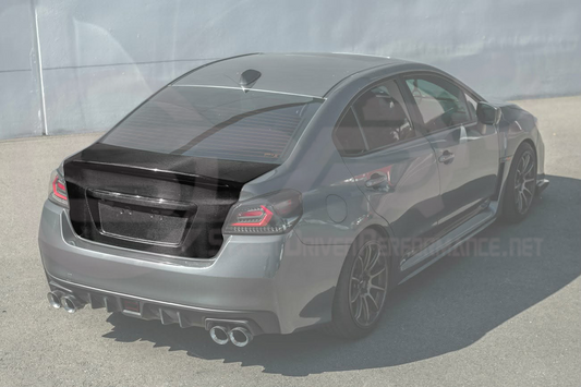 Carbon fiber rear trunk lid with integrated spoiler wing for 2015-2021 Subaru WRX STI, showing the sleek, lightweight design.