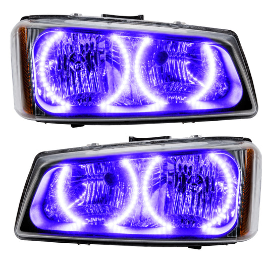 Oracle Lighting LED halo headlights for 2003-2006 Chevrolet Silverado in UV purple with pre-assembled design, showcasing the headlights' halo rings.