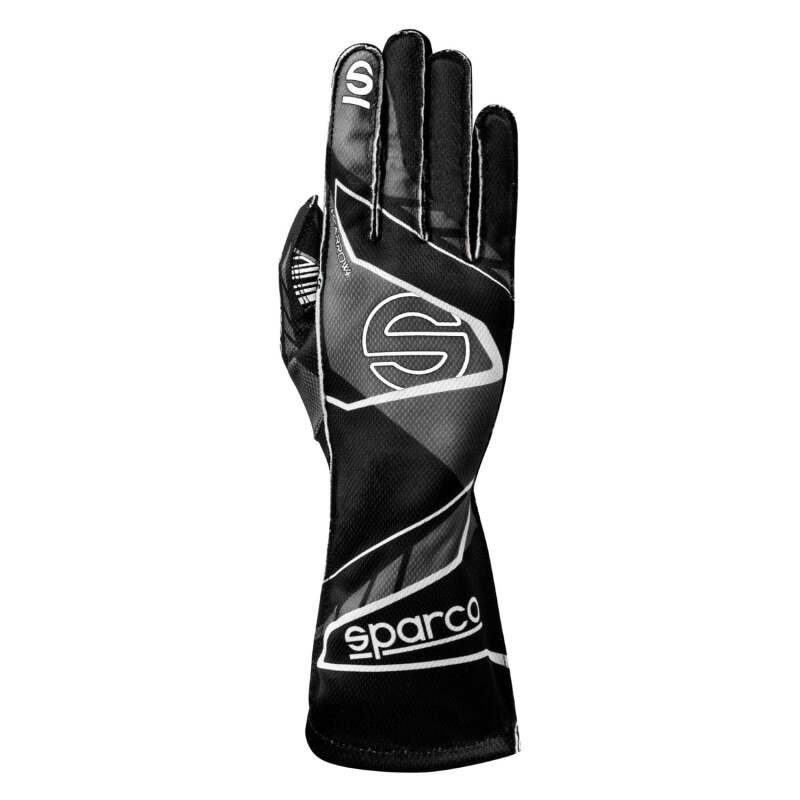 Black and white Sparco K-Arrow 7 racing gloves with grip details, designed for motorsport driving.