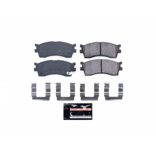 PowerStop Z23 Evolution Sport brake pads with hardware for 2002-2005 Kia Rio front brake system, performance replacement parts.