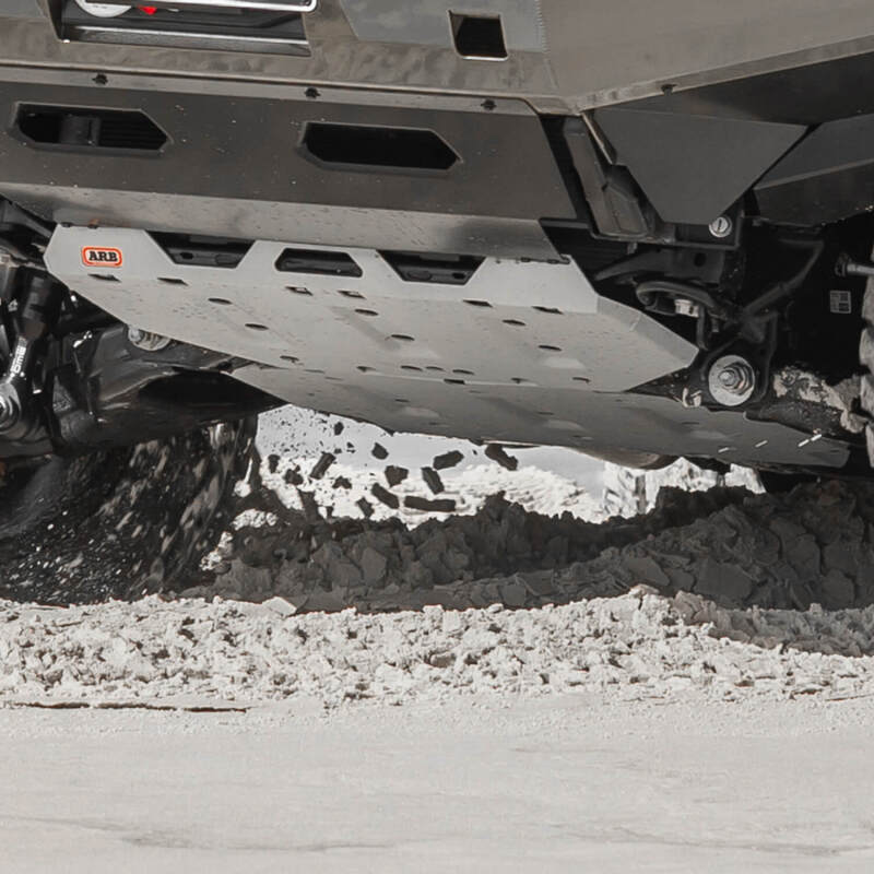 ARB 2024+ Toyota Tacoma front skid plate, durable steel protection for off-road vehicles, with mounting hardware visible.