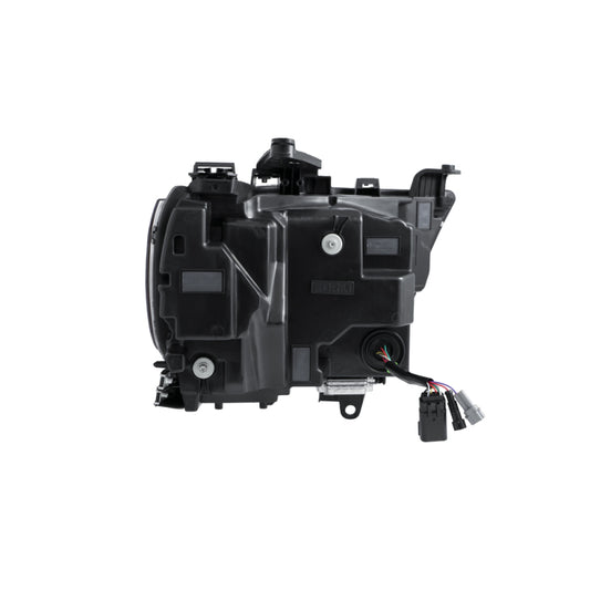 Pair of FORM Lighting Ram 1500 2019-2024 sequential LED projector headlights showing sleek design and bright illumination.