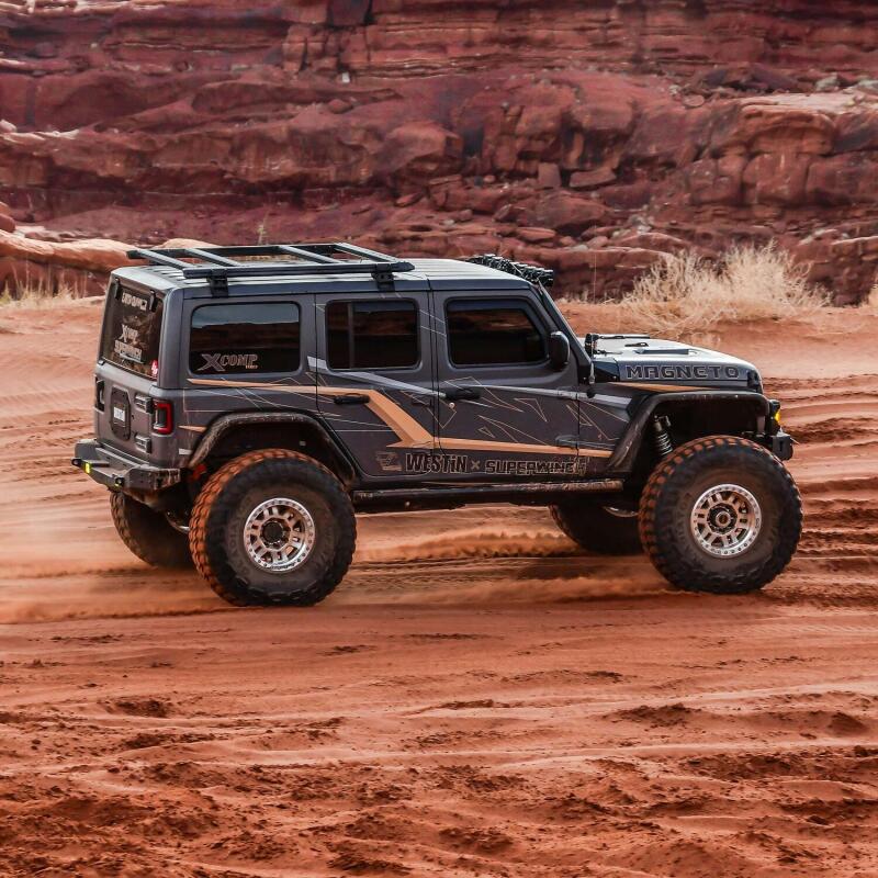 Westin Jeep Wrangler JL Unlimited roof rack with black metal bars and mounting points for versatile cargo carrying.
