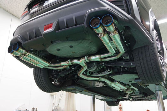 HKS 2021 Subaru WRX LEGAMAX Sport catback exhaust system installed on a car, showcasing the sleek exhaust tips and piping.