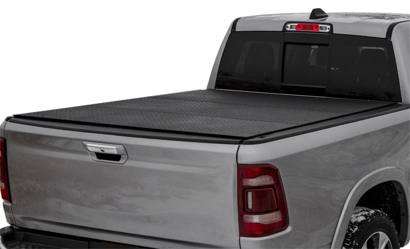 Access LOMAX Tri-Fold cover in black diamond mist for 2019 Dodge Ram 1500 5ft 7in truck bed, exterior truck bed accessory.