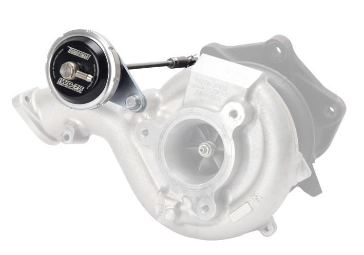 Turbosmart IWG75 black internal wastegate actuator installed on Mitsubishi EVO 10, rated for 24 PSI boost pressure.