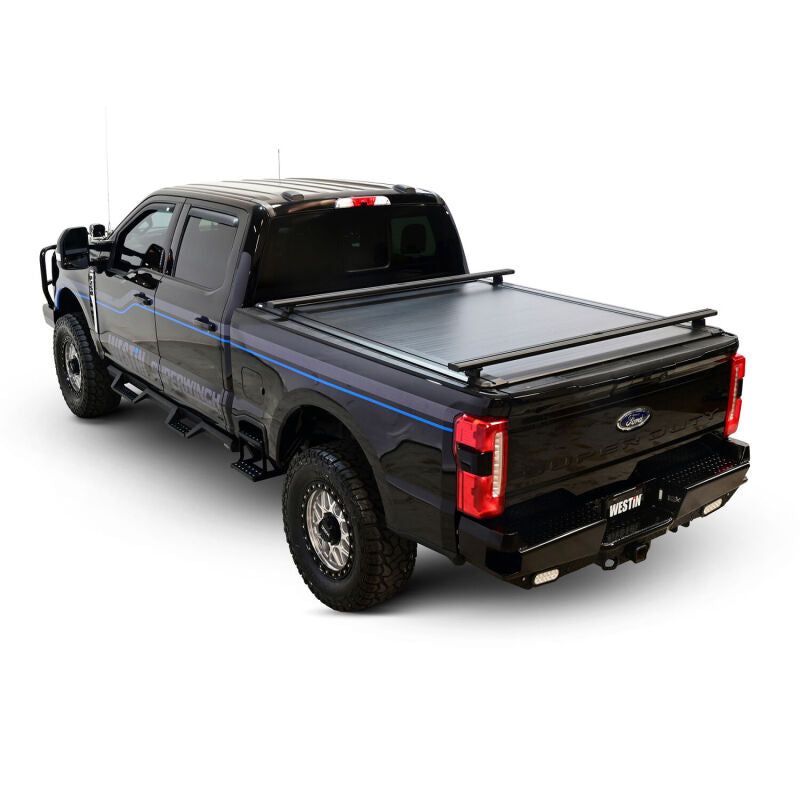 Westin retractable tonneau cover in black on a Ford F-250/F-350 SD with 6.8ft bed, shown installed on truck bed.