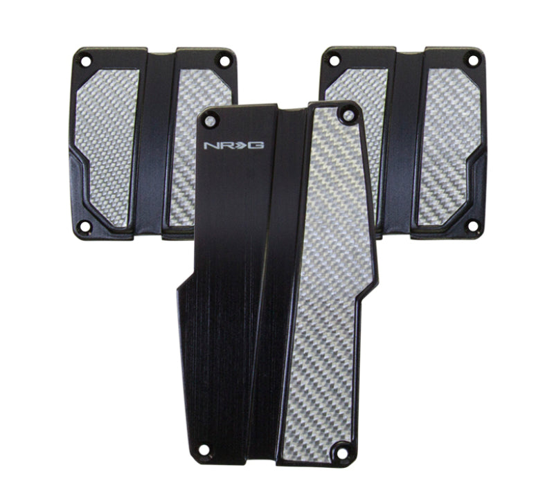 NRG brushed aluminum sport pedal covers with black and silver carbon accents for manual transmission vehicles.