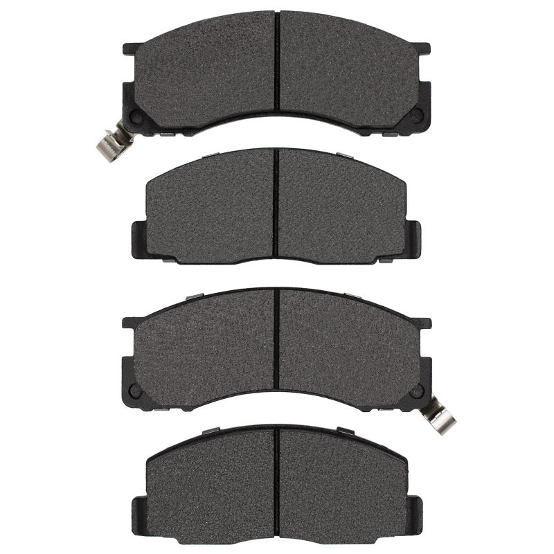 R1 Concepts Toyota Previa 1991-1996 front OE brake pads installed, showing clean brake pad surface and metal backing plate.