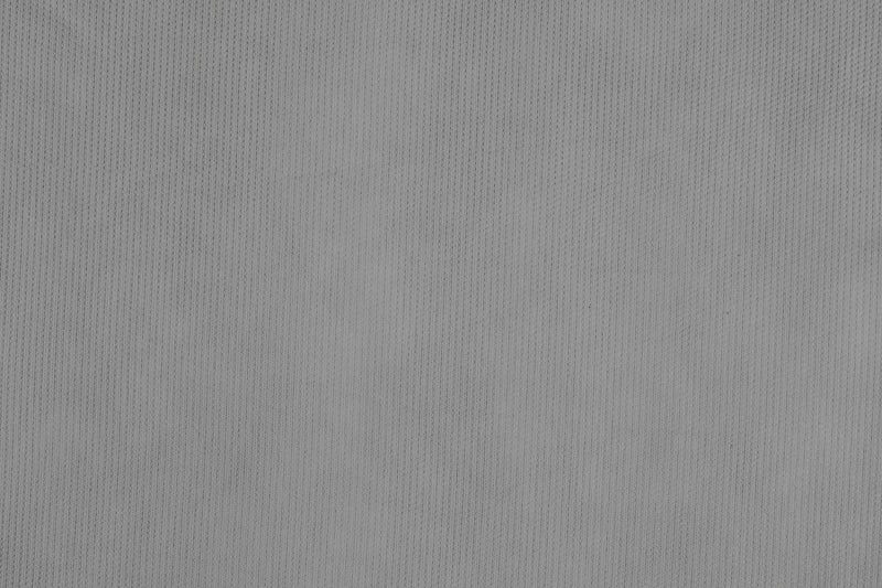 Gray Covercraft custom car cover for 1999-2004 Ford Lightning, 3-layer moderate climate protection, fits snugly over vehicle.