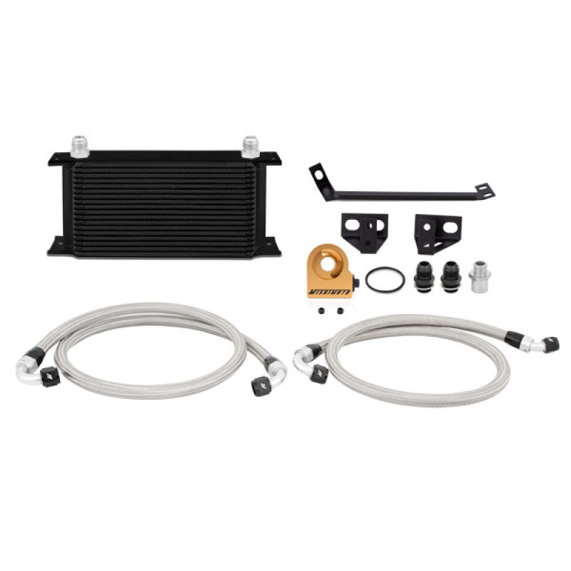 Mishimoto black thermostatic oil cooler kit for 2015 Ford Mustang EcoBoost, with hoses and mounting brackets visible.