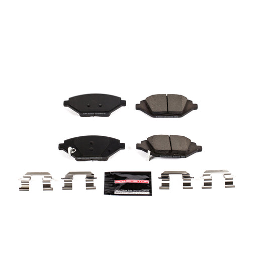 PowerStop Z23 Evolution sport brake pads with hardware installed in a Chevrolet Spark front brake assembly.