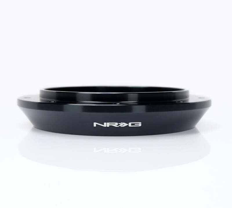 NRG 6 to 9 hole steering wheel hub adapter for quick and secure installation in automotive steering systems.