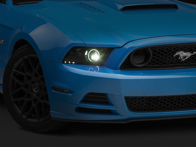 Raxiom 08-23 Ford Mustang Axial Series HID bulb upgrade in 6000K, showcasing the bright white headlight bulb.