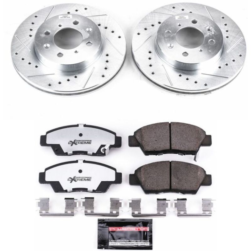 PowerStop Z26 Street Warrior front brake kit installed on a 2009-2014 Honda Fit, featuring performance brake components.
