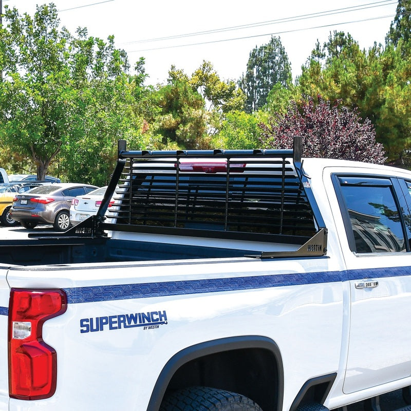 Black Westin headache rack installed on a Chevrolet, Ford, GMC, or Toyota Silverado/Sierra 1500-3500 HD truck, showcasing rugged steel design.