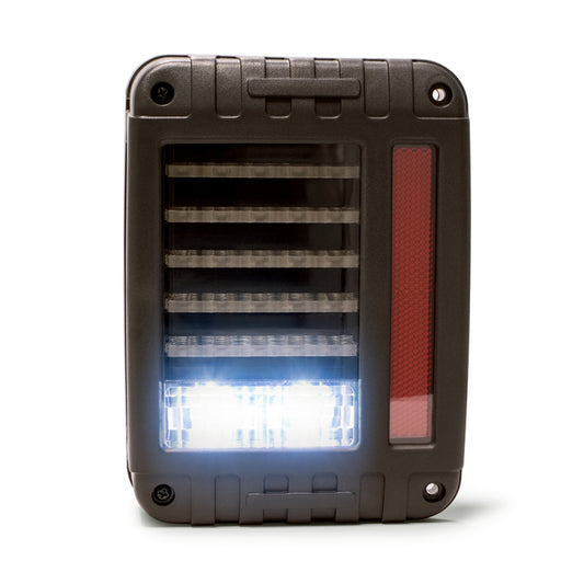 DV8 Offroad Jeep Wrangler JK LED tail light, horizontal design, rugged off-road style, mounted on the rear of the vehicle.